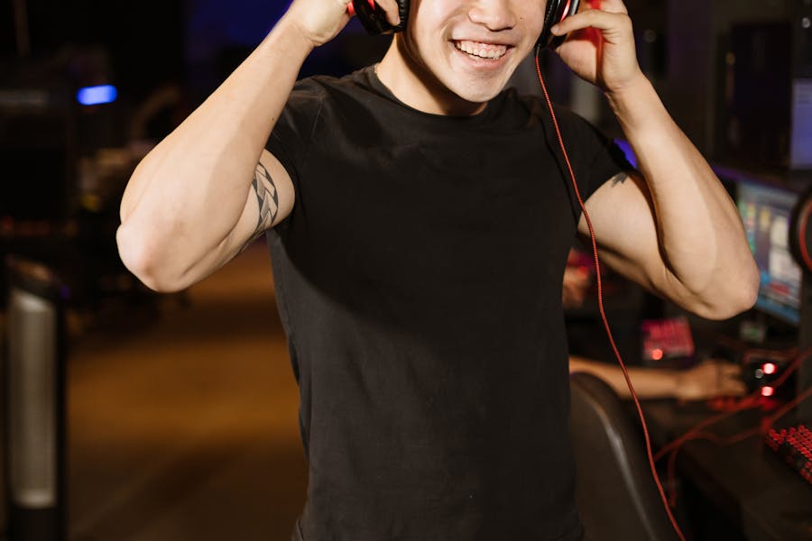 Smiling gamer wearing a headset (placeholder)