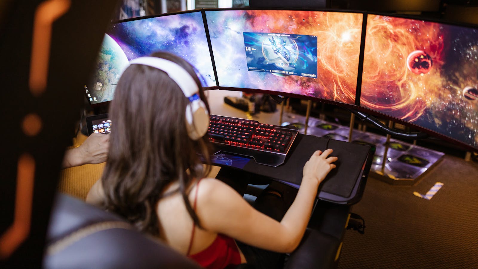 2 Mars gaming club interior — players at RTX stations (placeholder)